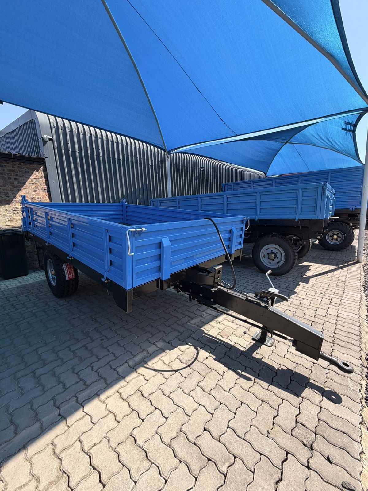 Tipper Trailers, front three-quarter view