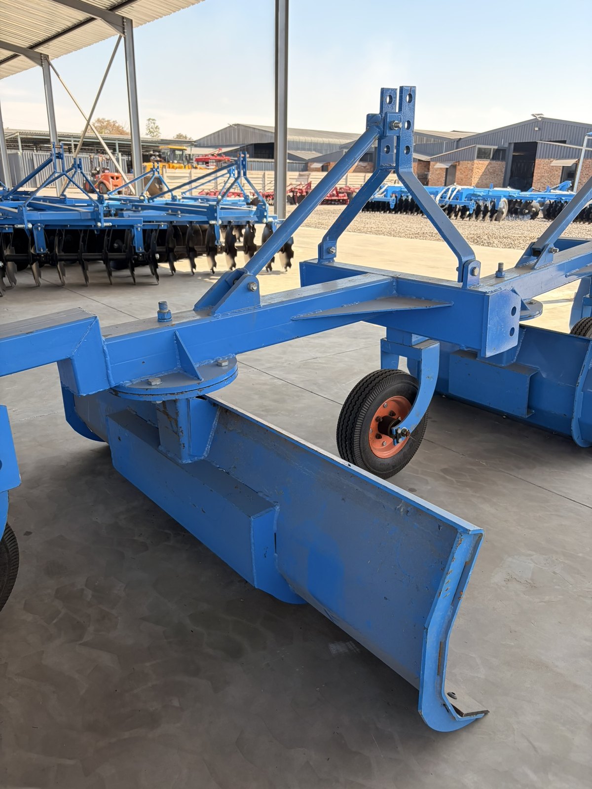 Grader Blades, three-quarter view