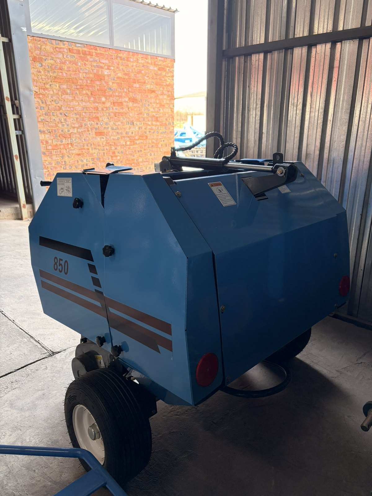 Mini Round Baler, three-quarter view (frame 4)