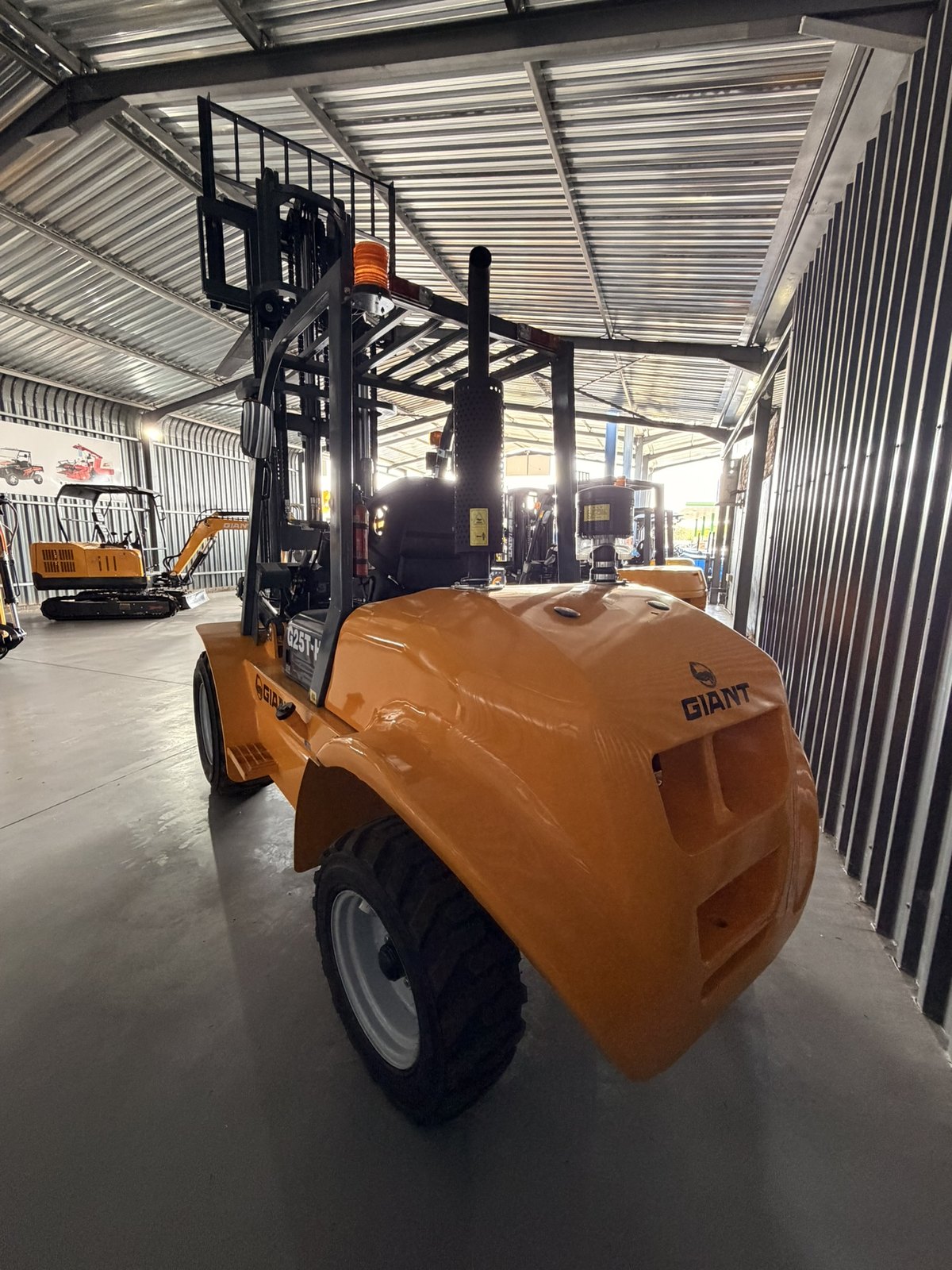 Forklift, 2,500 kg, 3 Stage, All Terrain, photographed on the supplier's floor