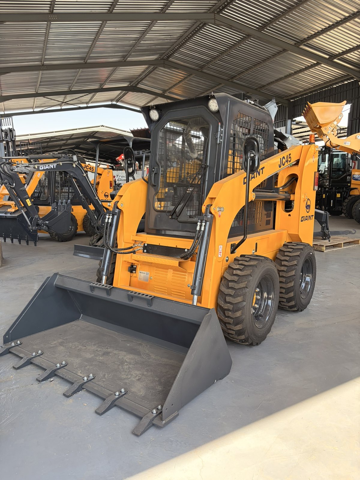 JC45 Skidsteer Loader, front three-quarter view (frame 2)
