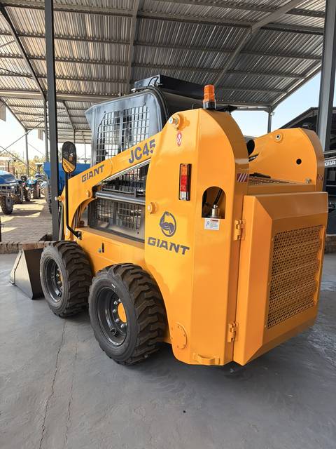 JC45 Skidsteer Loader, rear three-quarter view