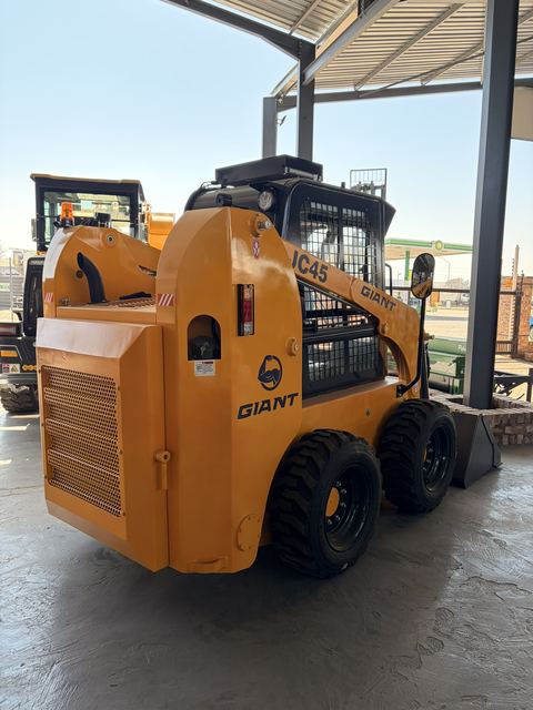JC45 Skidsteer Loader, rear three-quarter view (frame 4)