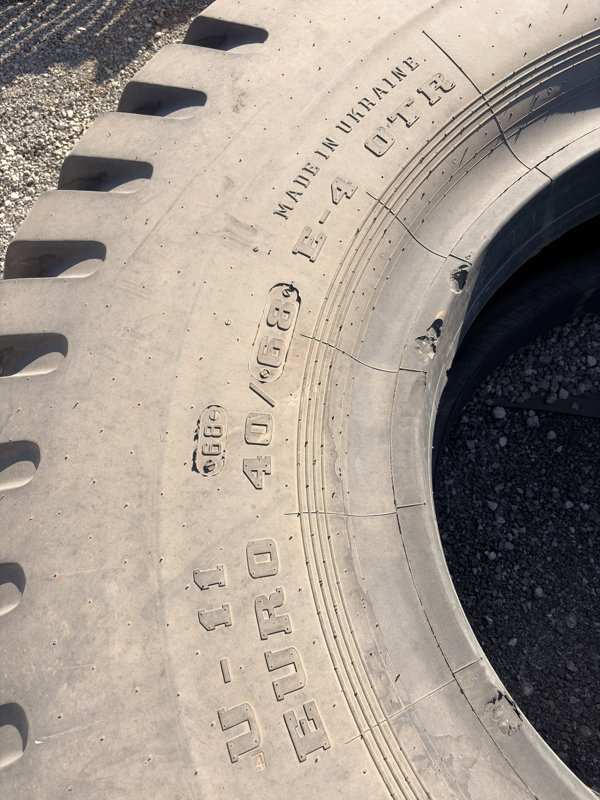 Close view of the sidewall markings: EURO-11 pattern, E-4 OTR and Made in Ukraine
