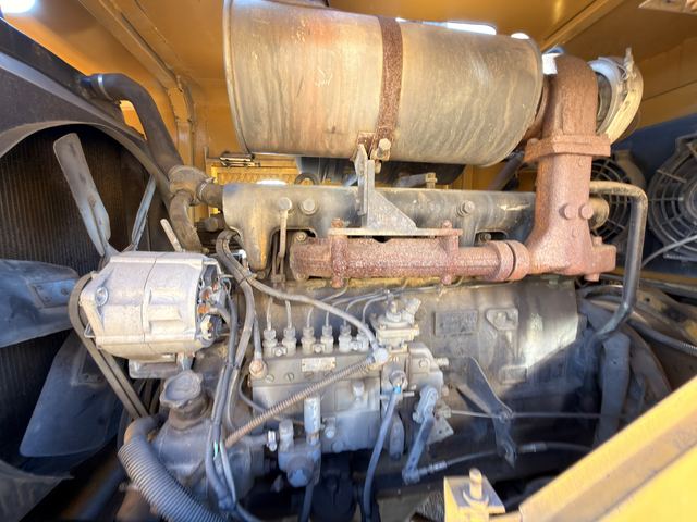 The engine bay of the used Fugong front end loader, injector pump side