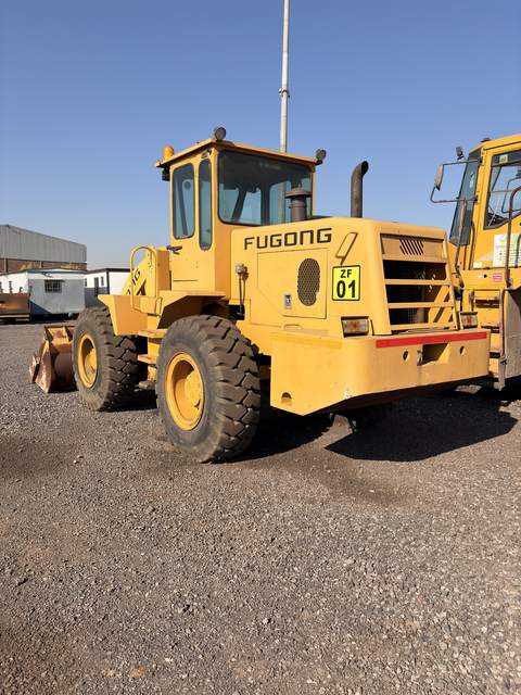 Used Fugong front end loader, side view of the whole machine in the yard