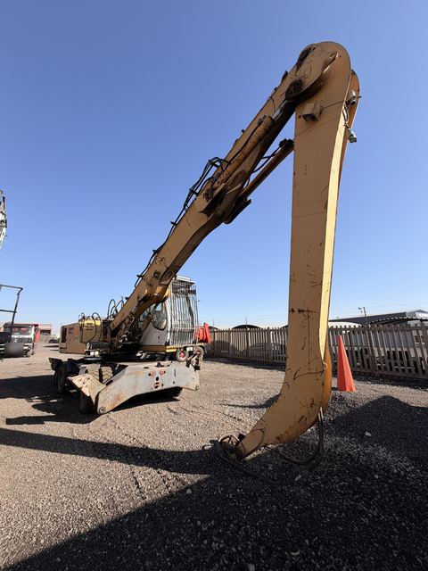 Used Liebherr 924 material handler, view along the boom towards the cab