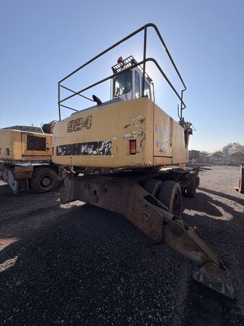 Used Liebherr 924 material handler, rear view of the counterweight and machine badge