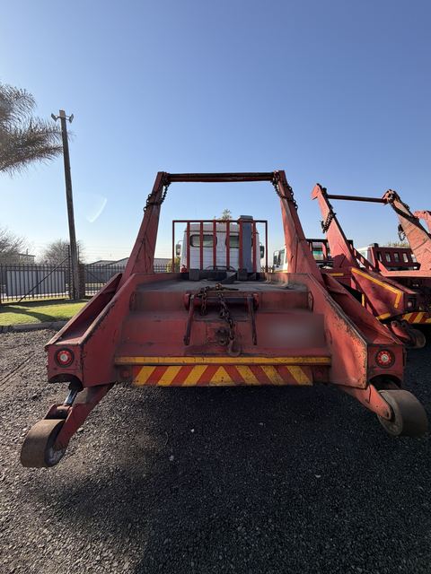 Used Mercedes skip loader truck, rear view of the skip-loading gear