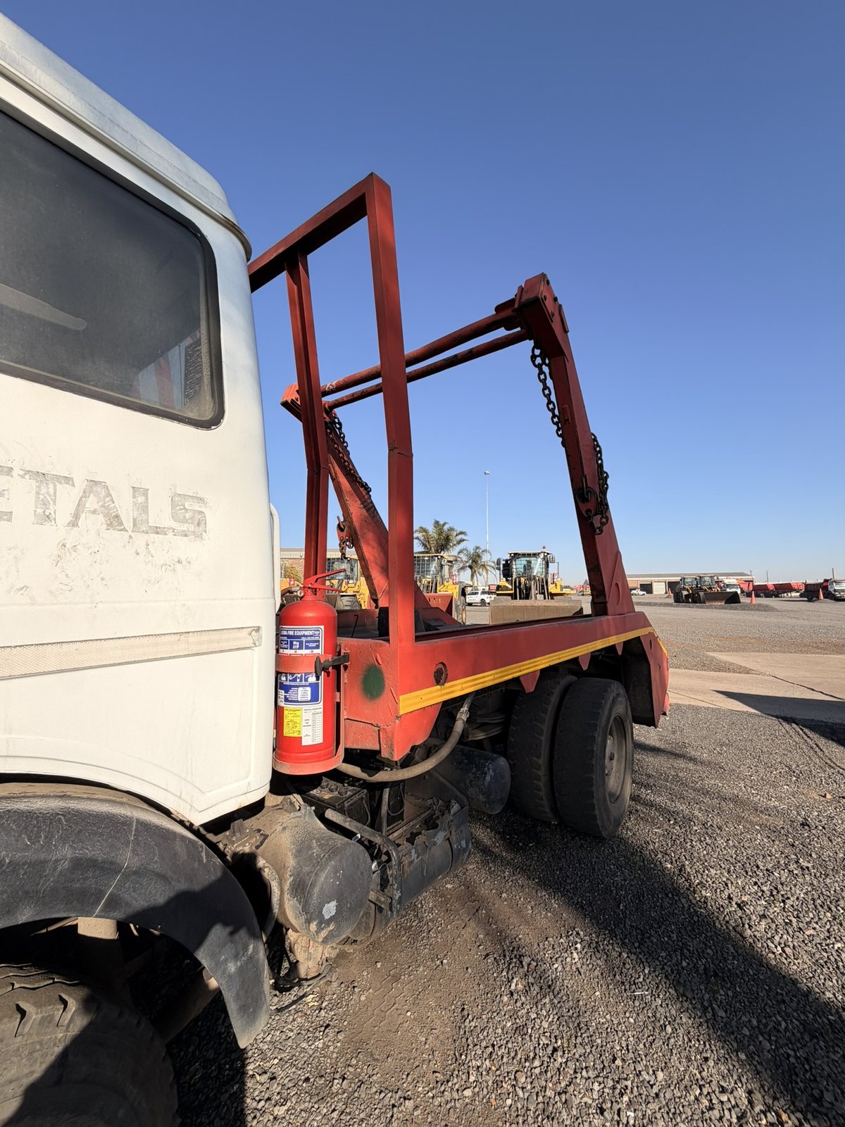 Used Mercedes skip loader truck, cab and skip gear from the rear quarter