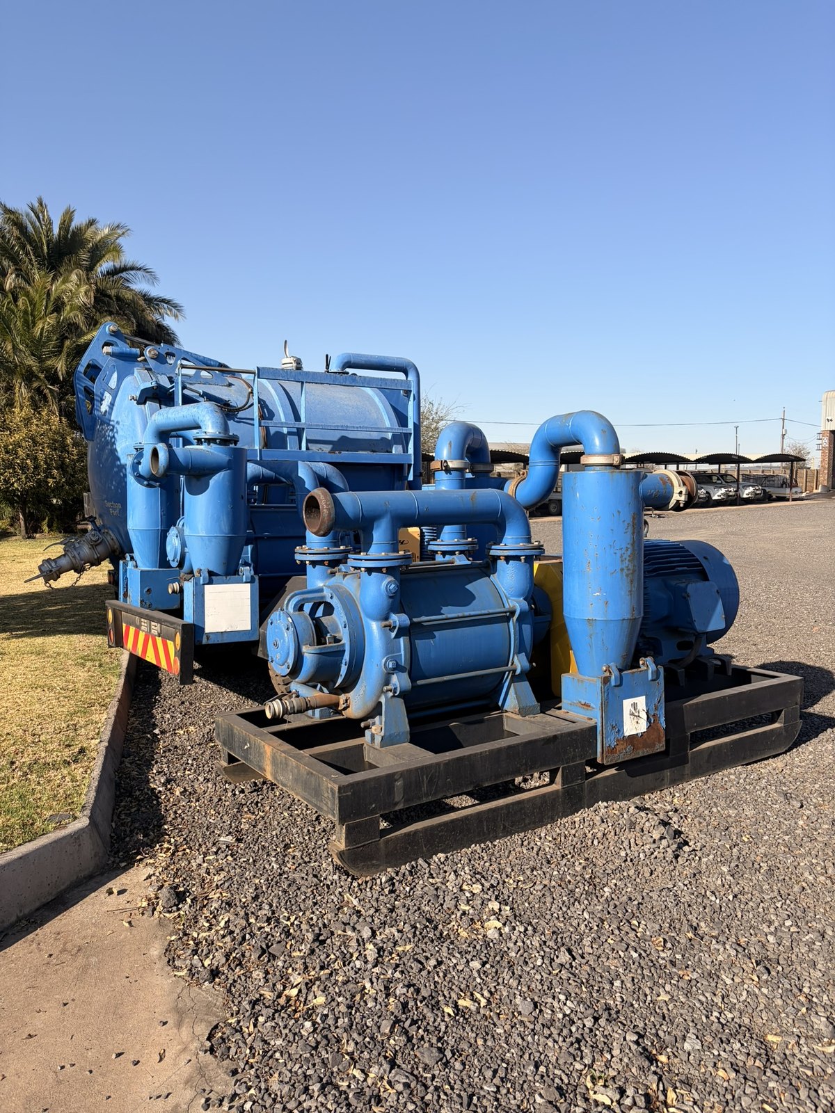 Used skid-mounted slurry pump, side view of the pump and frame