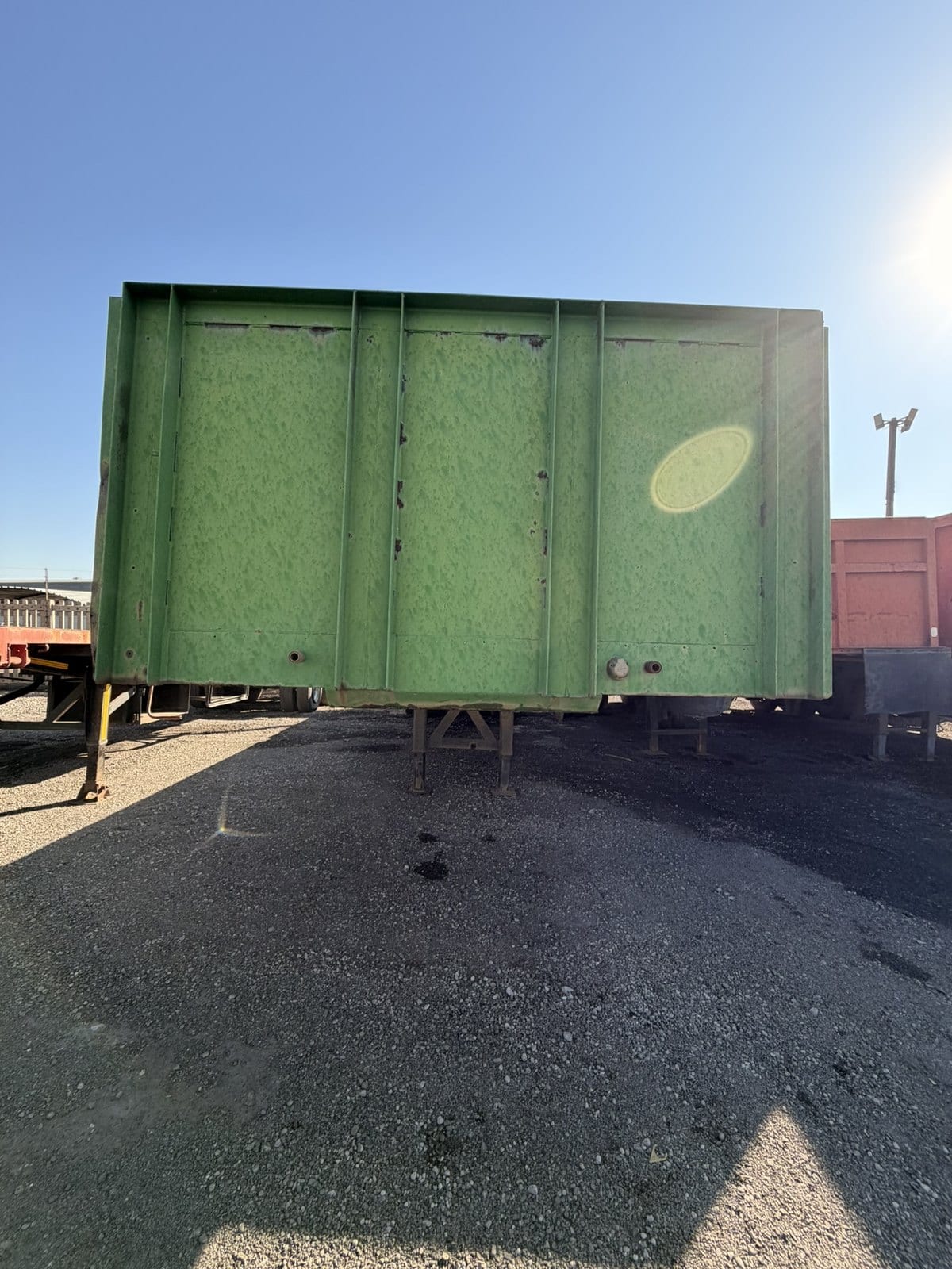 Used 12m trailer with high steel sides, side view of the high steel sides along the deck